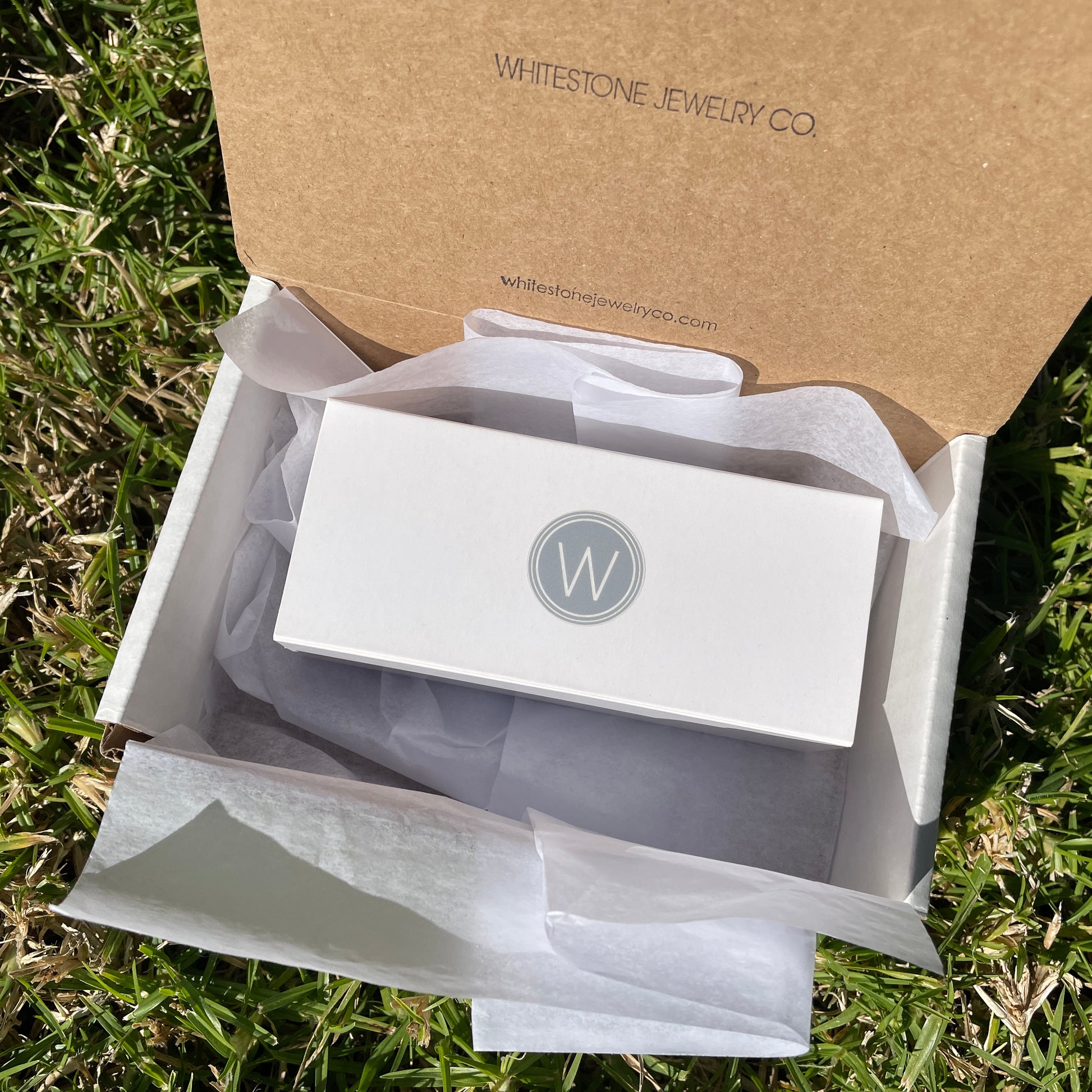 whitestone jewelry co. ring set in customized display box.
