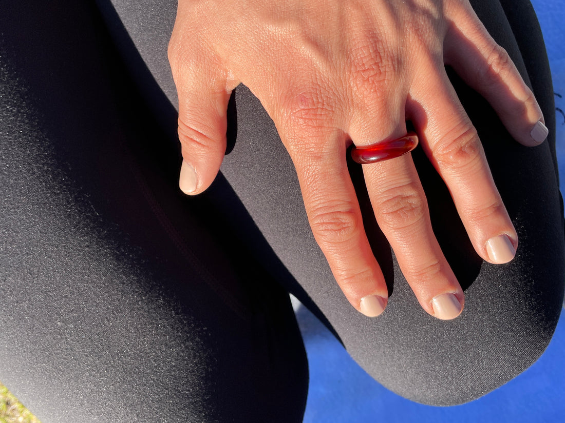 woman wearing topange red carnelian stone ring from whitestone jewlery co.