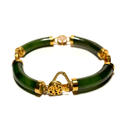 Green bracelet with gold accents on a white background