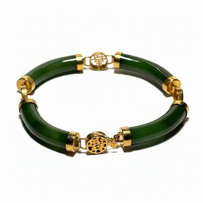 Green bracelet with gold accents on a white background