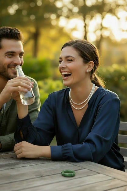 Pearl necklace 2 strands on a woman with a man in the park laughing