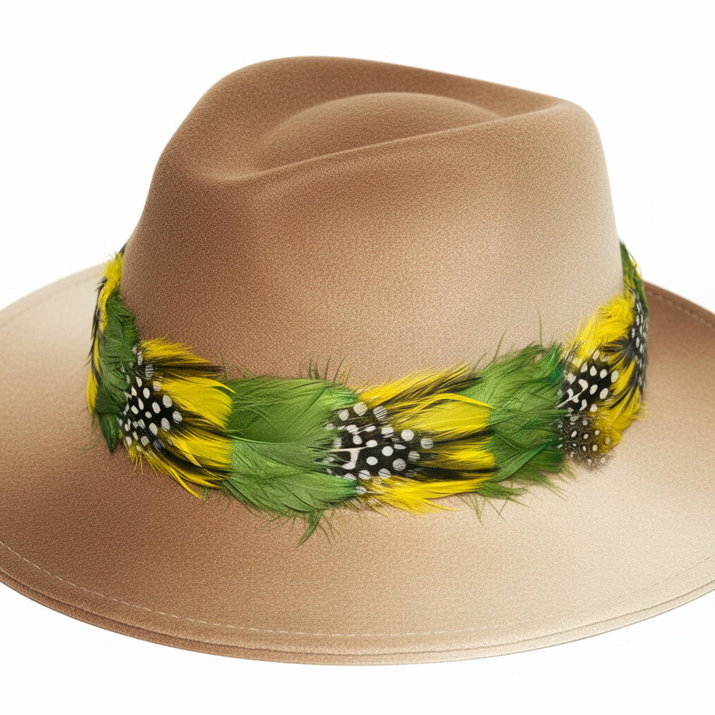 Red hat with green and yellow feather decorations on a white background